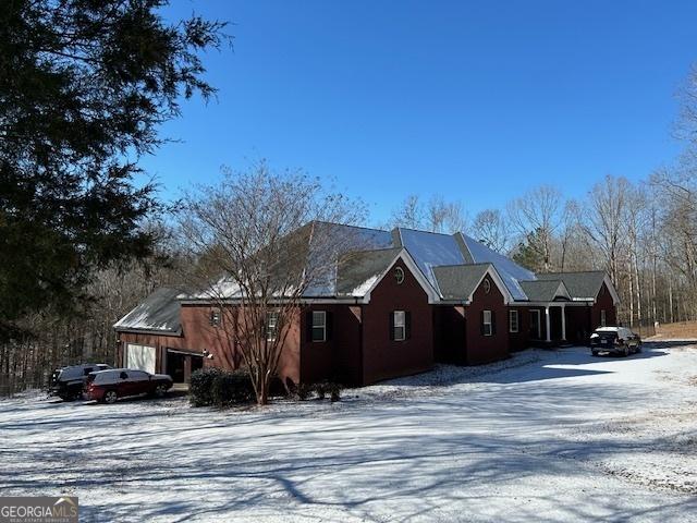 view of snow covered property