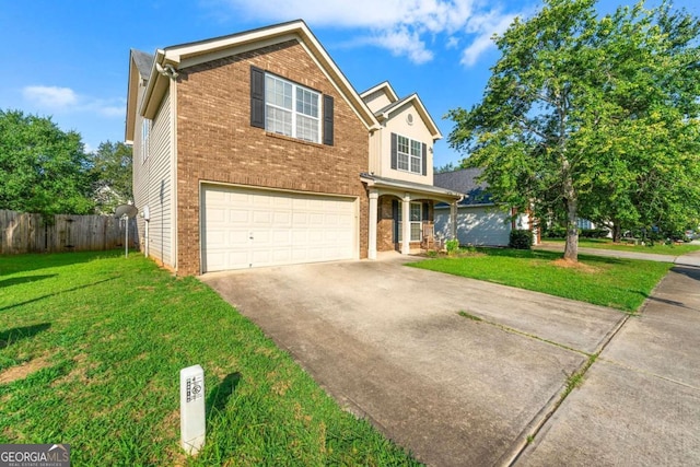 view of front property with a garage and a front yard