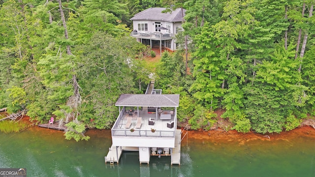 drone / aerial view featuring a water view