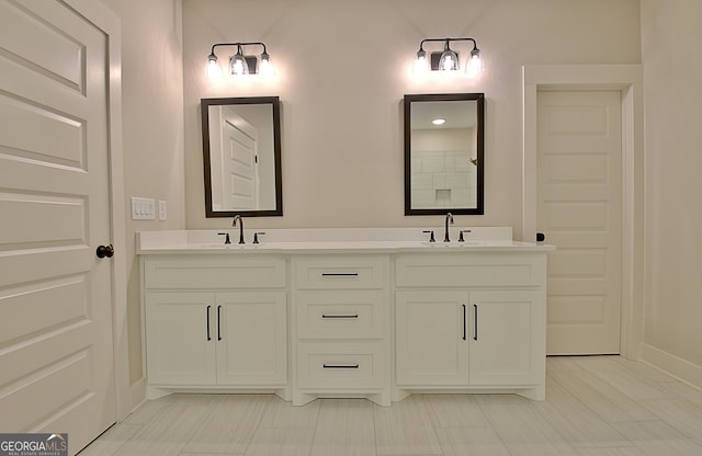 bathroom featuring vanity and tile patterned flooring