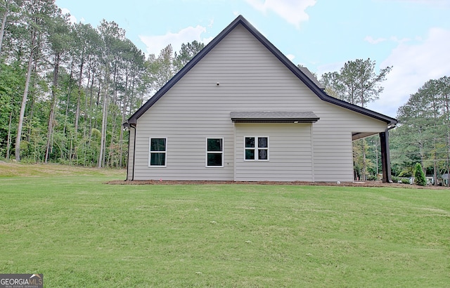 view of property exterior featuring a yard