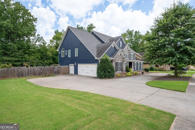 view of property exterior with a garage and a yard