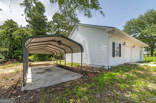 exterior space with a carport