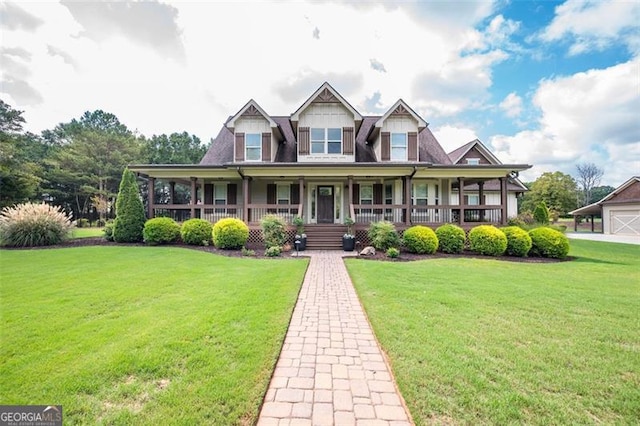 view of front facade with a porch and a front lawn