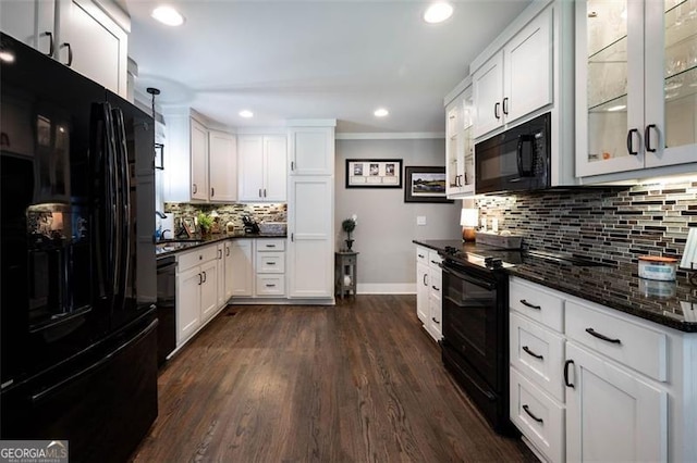 kitchen featuring black appliances, white cabinets, dark wood-style floors, and tasteful backsplash