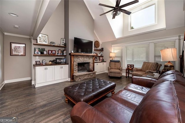 living area featuring a fireplace, baseboards, ceiling fan, and dark wood-style flooring