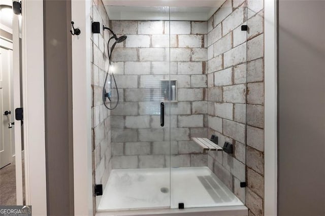 full bathroom with a shower stall