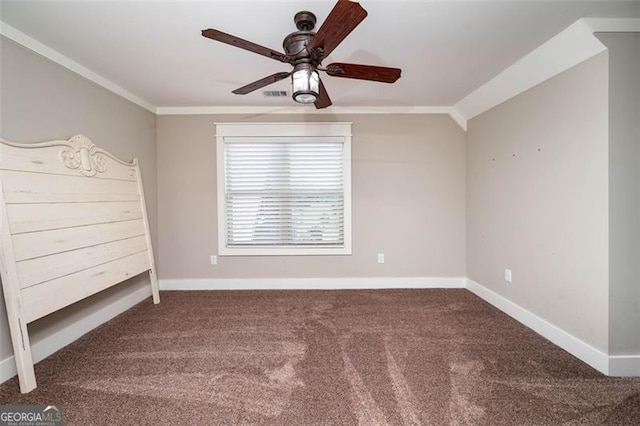 unfurnished bedroom with carpet floors and crown molding