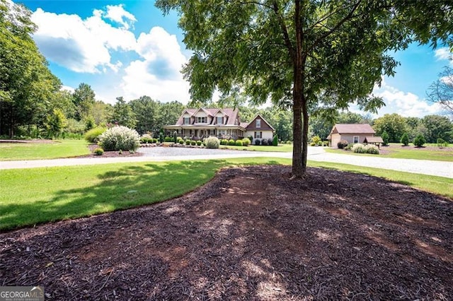 view of community featuring a lawn