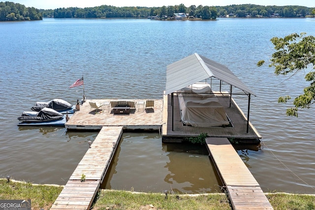 dock area featuring a water view