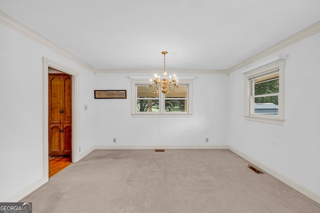 unfurnished room with crown molding, light carpet, and a chandelier