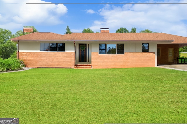 ranch-style house with a front yard