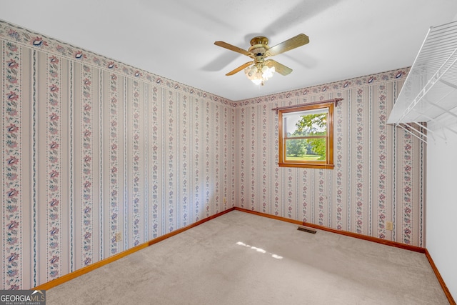 unfurnished bedroom with carpet and ceiling fan