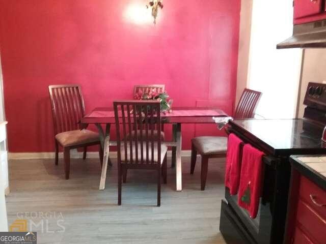 dining area with light wood-type flooring