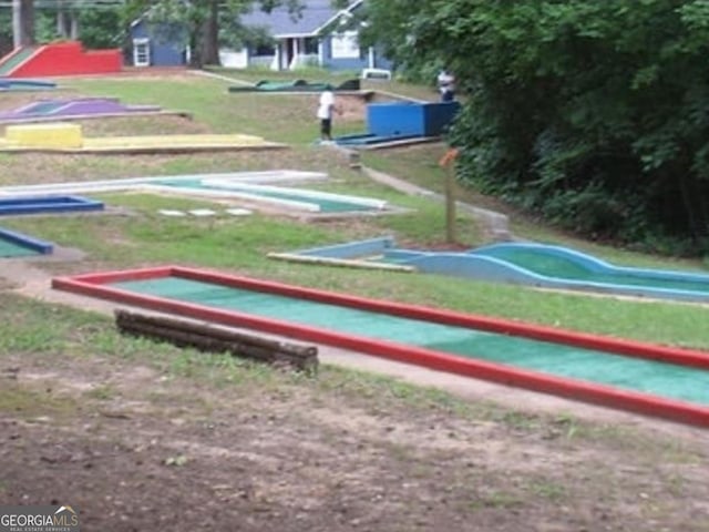 view of home's community featuring a yard