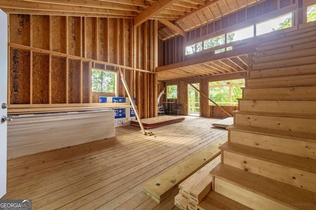 interior space featuring a wealth of natural light and hardwood / wood-style flooring