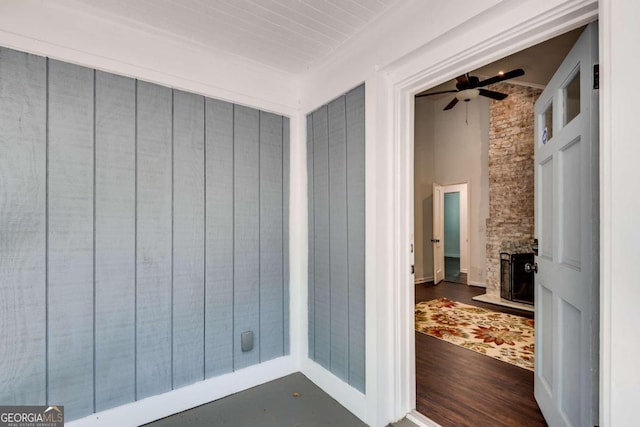 bathroom featuring ceiling fan and wood-type flooring