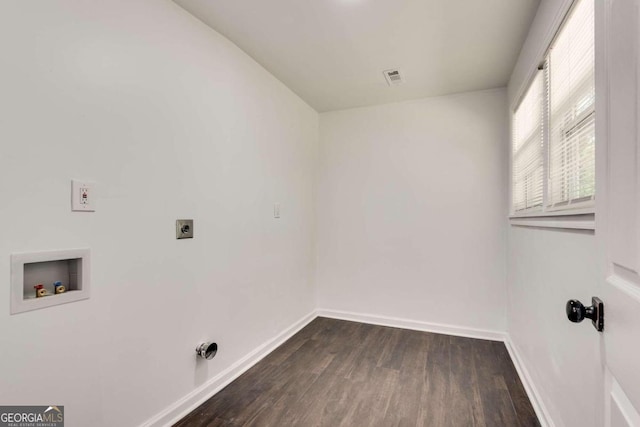 laundry area with dark hardwood / wood-style flooring, hookup for a washing machine, and hookup for an electric dryer