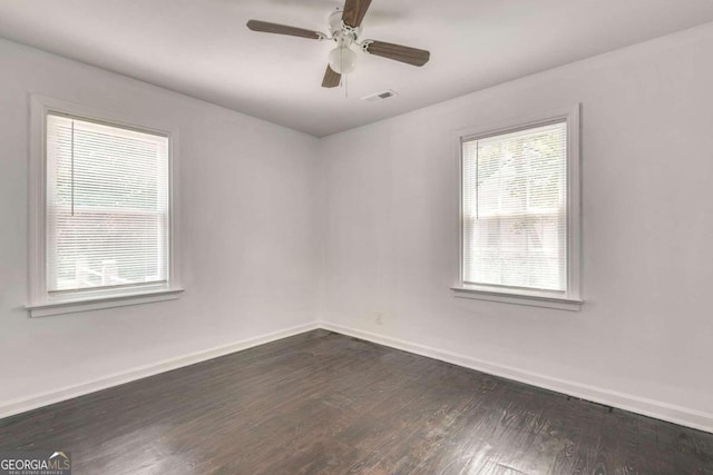 unfurnished room with ceiling fan and wood-type flooring