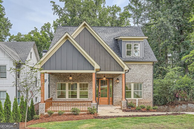 craftsman-style home featuring covered porch