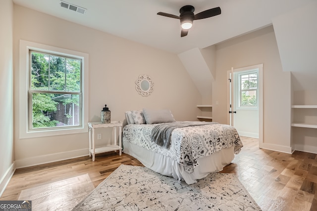 bedroom featuring ceiling fan and light hardwood / wood-style flooring