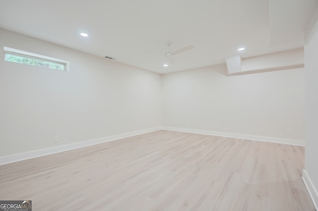 basement featuring light wood-type flooring