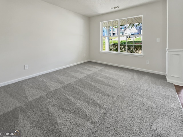 empty room with carpet floors