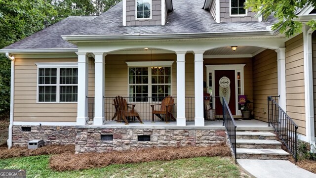 property entrance featuring covered porch