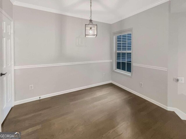 unfurnished dining area featuring dark hardwood / wood-style floors