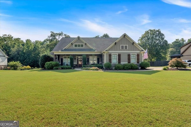 craftsman-style house with a front lawn