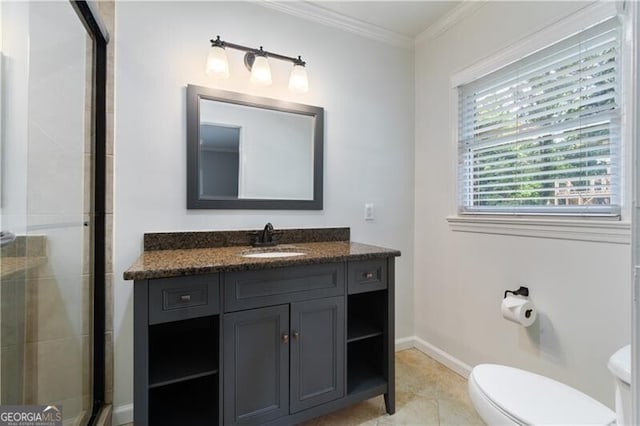 bathroom featuring tile patterned floors, vanity, crown molding, toilet, and a shower with door