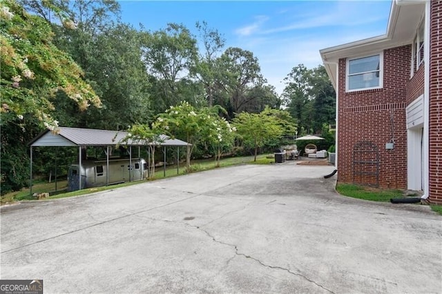 exterior space featuring a carport