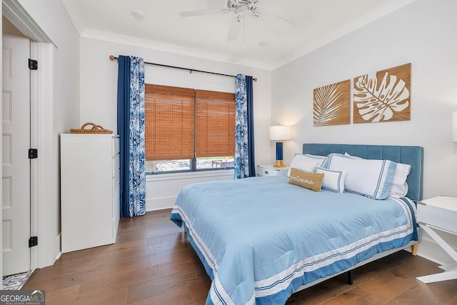 bedroom featuring ceiling fan and wood finished floors