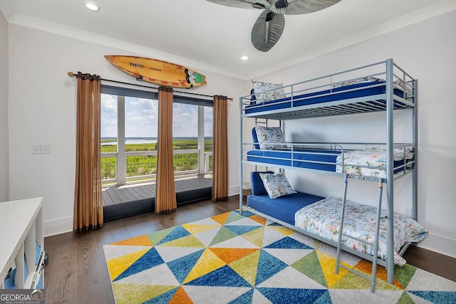 bedroom with crown molding, recessed lighting, wood finished floors, and baseboards