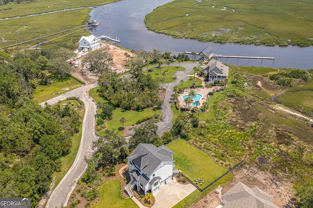 aerial view featuring a water view