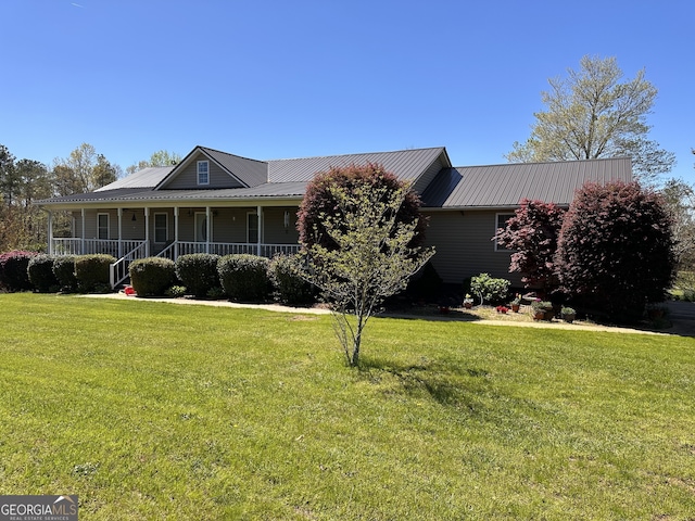 view of front of property with a front lawn and a porch