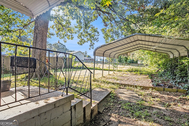 view of yard featuring a carport