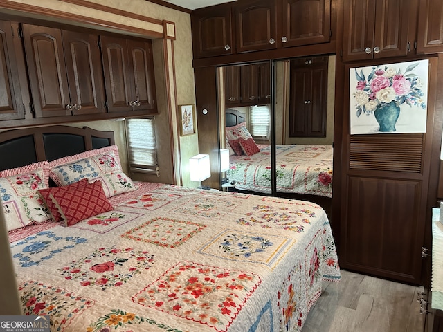 bedroom with light hardwood / wood-style floors