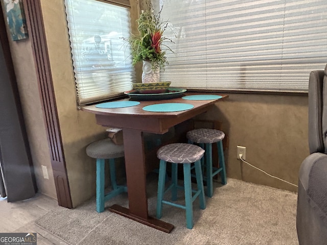 view of carpeted dining area