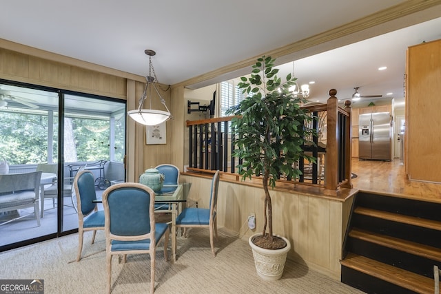 dining room featuring ceiling fan and a healthy amount of sunlight