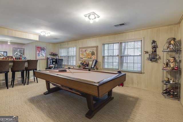 rec room featuring wood walls, pool table, and light carpet