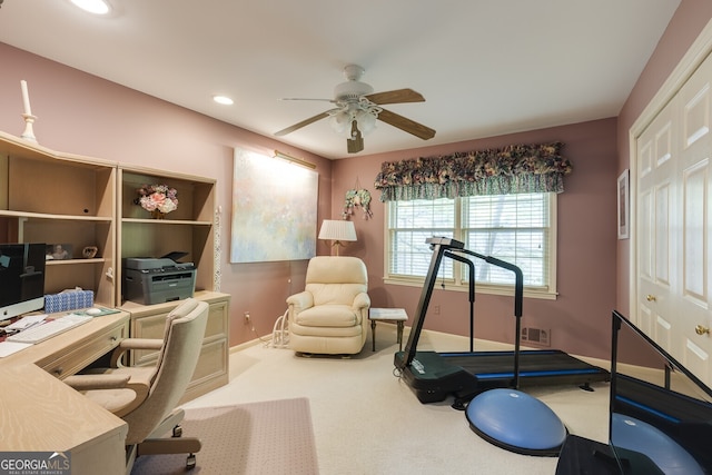 home office with carpet and ceiling fan