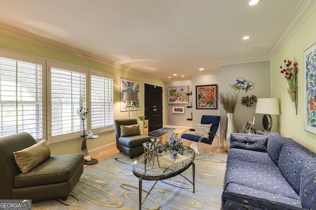 living room with light hardwood / wood-style floors and ornamental molding