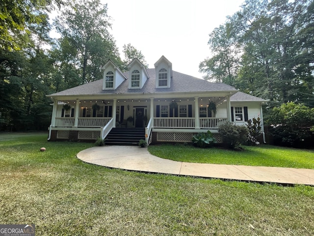 view of front of house featuring a front yard and covered porch