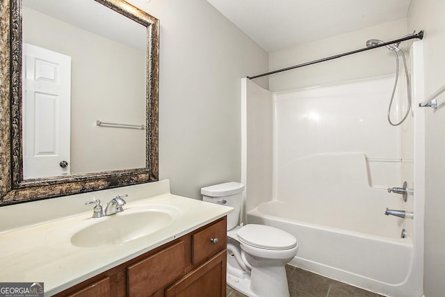 full bathroom featuring toilet, vanity, shower / washtub combination, and tile patterned flooring