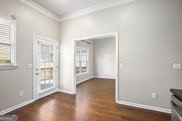 doorway to outside featuring dark wood-type flooring and crown molding