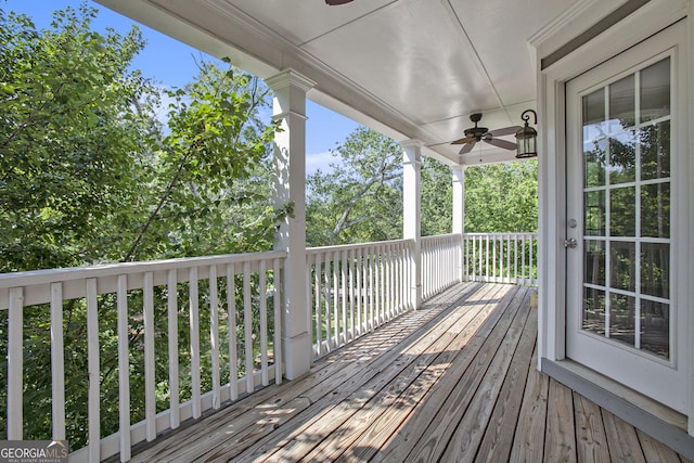wooden deck with ceiling fan