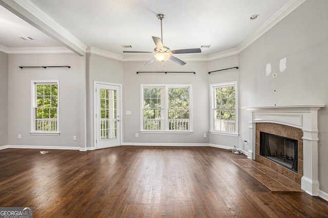 unfurnished living room with a fireplace, plenty of natural light, and dark wood-type flooring
