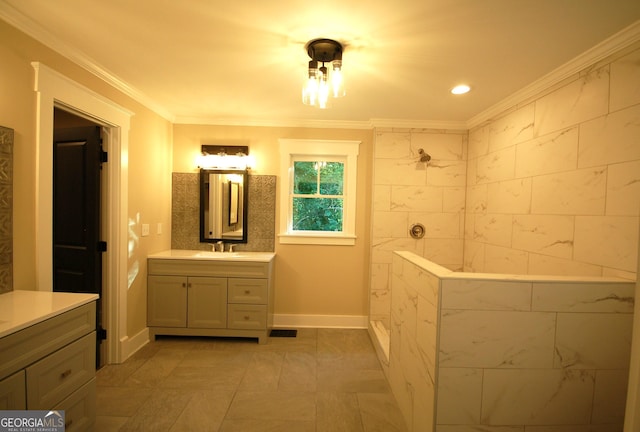 bathroom with vanity and ornamental molding