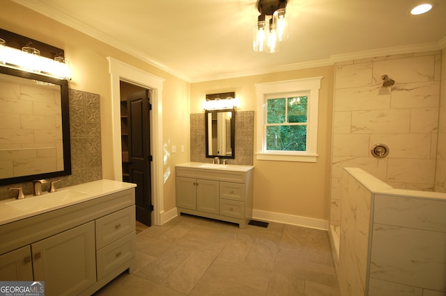 bathroom featuring crown molding and vanity